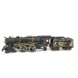 An American Flyer ‘Standard’ Gauge 4-4-2 Locomotive and Lionel Tender, the locomotive in black