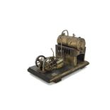 A Twin-Cylinder Horizontal Stationary Steam Engine by Falk, with cast engine bed supporting the