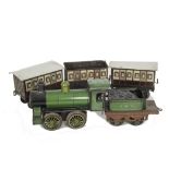A Gauge I Clockwork GNR 0-4-0 Locomotive and Tender and Three Coaches by Bing, the non-reversing