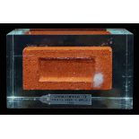 You've Been a Brick Award, 1972 acrylic encased 'brick' with presentation label, 'Christopher Lee