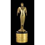 Telly Award, 2004 gilt metal winged figure, on a circular stand, the latter with presentation pla