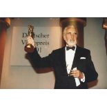 Deutscher Videopreis, Lifetime Achievement Award, 2001 metalled figure of a man, with hands aloft