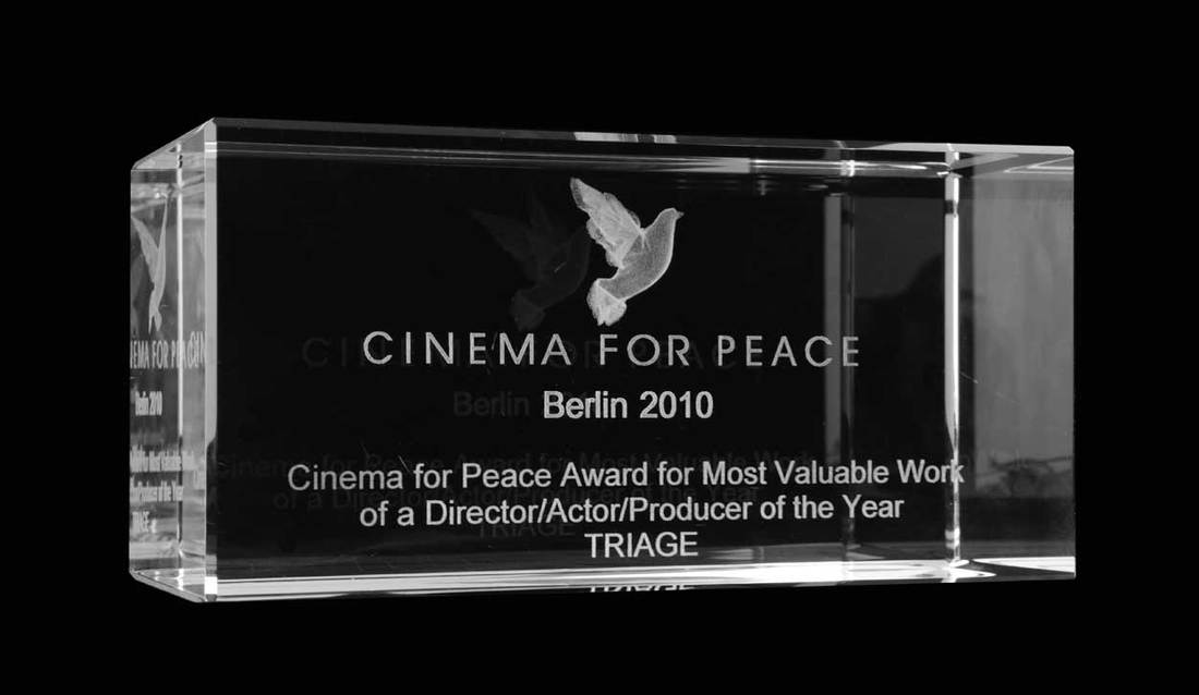 Cinema for Peace Awards, Berlin, 2010 rectangular glass trophy with inset dove and presentation i