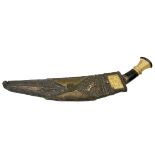 Nepalese Kukri. 19th-early 20th Century. Bone and wood grip with brass fitting, steel blade. Leathe