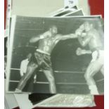 Boxing, a collection of 50 black/white press photographs, photographers name on reverse, mainly 10"