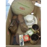 A collection of football memorabilia, to include a pair of old leather football boots, possibly from
