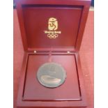 2008 Olympic Games, Beijing, an original bronze, participation medal in original red laquered box