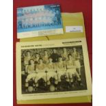 1957 Manchester Utd, a laminated and paper colour photograph, the team group engaged in the great