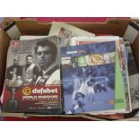 A collection of various football memorabilia, including Autographed Charles Buchan's Football