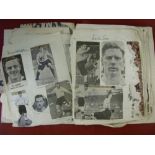 Autographs, a hardbacked exercise book, with newspaper/magazine cuttings, laid down and loose. There