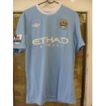 2010/11 Manchester City, a match worn home shirt, Premier League, by Number 3 Bridge, in the game