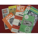 Manchester Utd, a collection of 8 away football programmes, including, 1963/64 Sporting Lisbon,