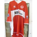 2005/2006 Middlesbrough, a red players home shirt as worn by Queudrue, Number 3 on reverse, the