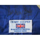 HENRY COOPER SIGNED ROBE Signed replica dark blue dressing robe with white trimmings and an