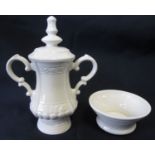 F.A. CUP A ceramic china., 9" in total, replica of the FA Cup. The Cup is engraved with the Football