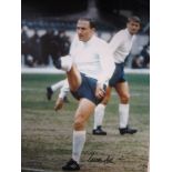 GEORGE COHEN AUTOGRAPH A signed 16" X 12" colour photograph of Cohen in England kit and Roger Hunt