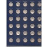 STERLING SILVER ENGLAND 1970 COINS A hardback album housing a complete set of 30 Sterling Silver