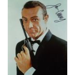 SEAN CONNERY AUTOGRAPH A 10" X 8" colour photograph in James Bond pose with a gun hand signed in