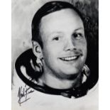 NEIL ARMSTRONG ASTRONAUT AUTOGRAPH A 10" X 8" black & white photograph of Armstrong in astronaut