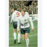 ALAN BALL AUTOGRAPH A 10" X 8" signed colour photograph of Ball in England kit. Good