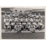 ARSENAL AUTOGRAPHS 1959-60 A b/w/ 8" X 6" teamgroup photograph signed by all 17 players.