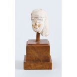 EGYPTIAN CARVED LIMESTONE HEAD OF A MAN