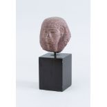 EGYPTIAN STYLE CARVED RED GRANITE HEAD OF A PHARAOH