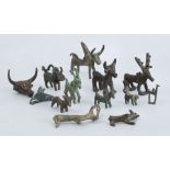 MISCELLANEOUS GROUP OF THIRTEEN ANCIENT BRONZE AND METAL STAG AND ANIMAL FORM PENDANTS