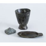 GROUP OF THREE CARVED STONE OBJECTS