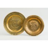 TWO CONTINENTAL BRASS REPOUSSÉ ALMS DISHES