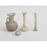 GROUP OF FOUR ANCIENT GLASS VESSELS