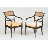 PAIR OF GEORGE III BLACK JAPANNED AND PARCEL-GILT ARMCHAIRS