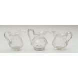 THREE SIMILAR ANGLO-IRISH CUT CRYSTAL PITCHERS