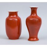 CHINESE CORAL-GLAZED PORCELAIN BALUSTER-FORM VASE AND A CORAL-GLAZED OVOID VASE