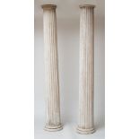 TWO SIMILAR PAINTED AND FLUTED COLUMNS