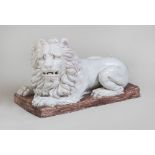 CONTINENTAL WHITE GLAZED POTTERY RECUMBENT LION