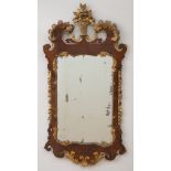 GEORGE II MAHOGANY PARCEL-GILT MIRROR