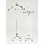 TWO CONTINENTAL WROUGHT-IRON FOUR-LIGHT CANDELABRAS
