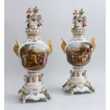 PAIR OF GERMAN ROCOCO STYLE PORCELAIN LARGE PICTORIAL VASES, COVERS AND STANDS