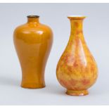 CHINESE MUSTARD-GLAZED PORCELAIN VASE AND A SPONGED YELLOW-GLAZED PORCELAIN PEAR-FORM VASE