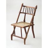 AMERICAN WALNUT AND ROPE SIDE CHAIR, STAMPED HUNZINGER WITH PATENT MARK