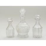 PAIR OF ANGLO-IRISH CUT CRYSTAL GRADUATED DECANTERS AND STOPPERS