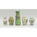 THREE CONTINENTAL DECOUPAGED URNS AND COVERS AND TWO VASES
