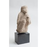 HARDSTONE CARVED GRANITE FIGURE OF A SEATED MONKEY