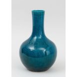 CHINESE DRAGON-INCISED TURQUOISE-GLAZED PORCELAIN BOTTLE VASE