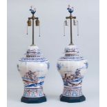 PAIR OF MODERN DELFT OCTAGONAL BALUSTER-FORM JARS AND COVERS, MOUNTED AS LAMPS