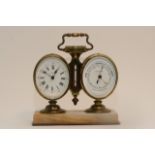 A brass twin mantle clock and barometer set with c