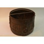A wrought iron and wood bucket of unusual design with a cross bar and ring handles possible middle