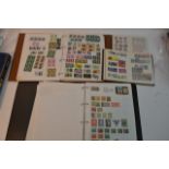A collection of 7 albums of world postage stamps including Italy, Portugal, France, Hungary, UAE,