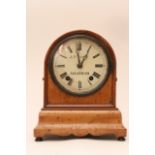 A burr wood mantle clock by S&F Baurle, Chatham, w